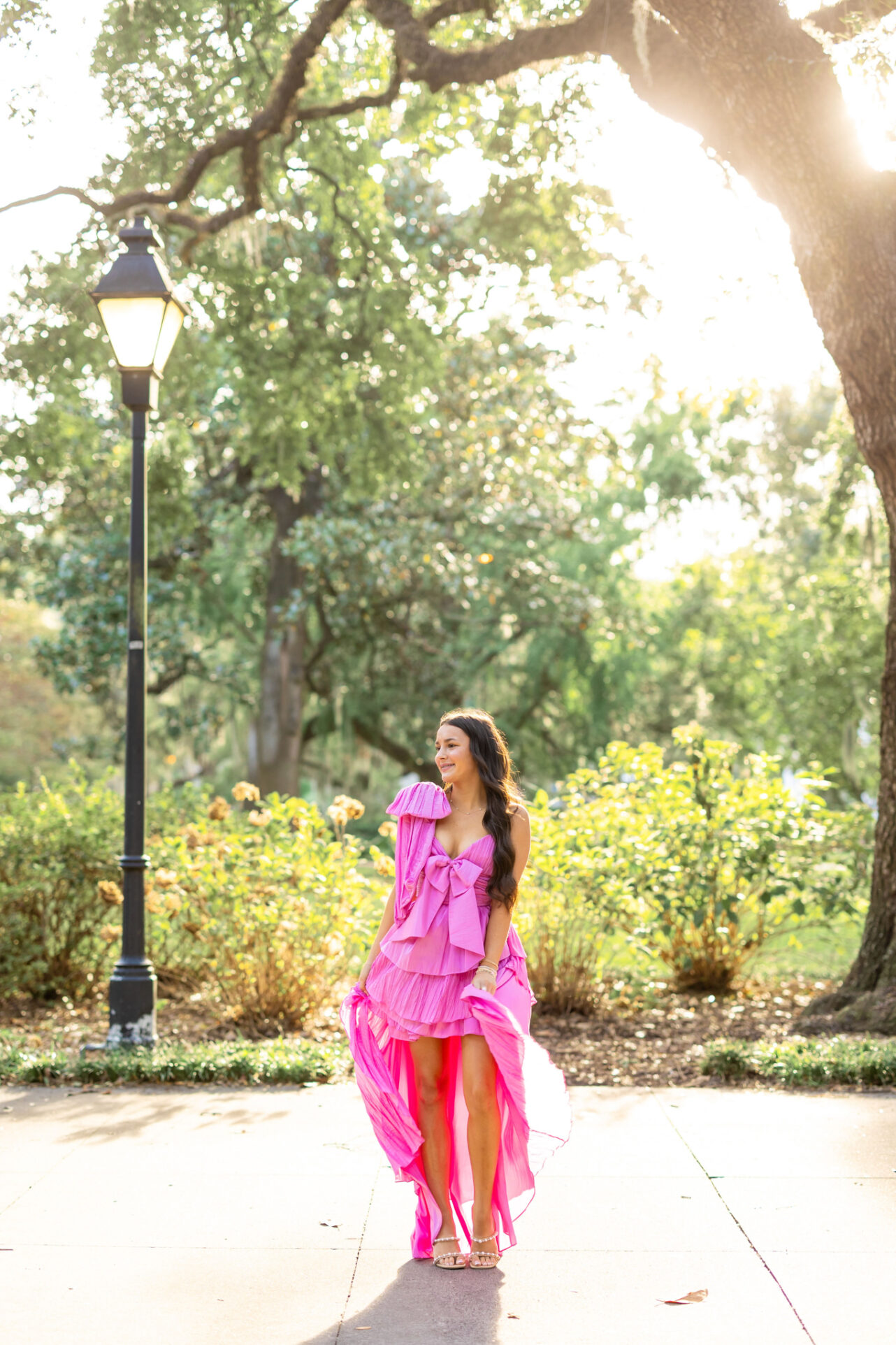 Stunning Girl in Forsyth Park, Savannah having her portraits done by Abi